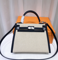 Top Selling Kelly 25 Bag With Outside Stitching, Made Of Textured Canvas & Soft Swift Leather Patchwork, Classic Black Silver Hardware Combination, Stunning Mixed Material Texture Dimensions: Length 25 * Width 10 * Height 18cm